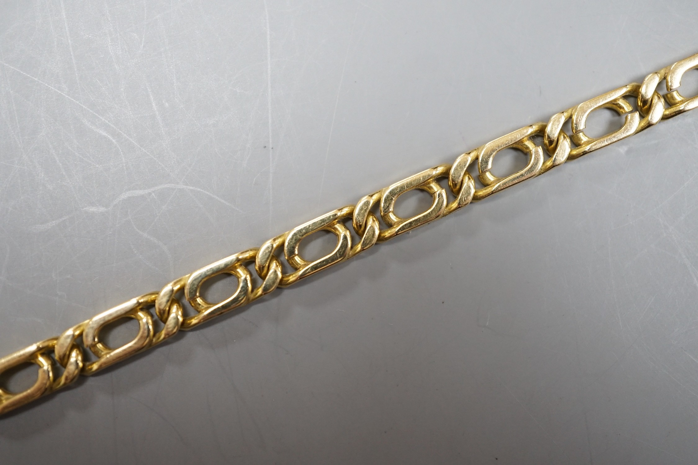 A modern 750 yellow metal rectangular link bracelet, 18cm, 18 grams.